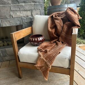 Brown Mudcloth Throw Blanket - Earthy Pattern with vase